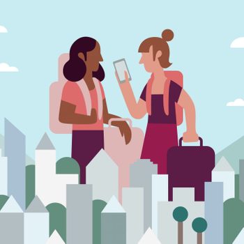 Two Girlfriends Look At Digital Nomad Visa While Traveling In Cityscape Together