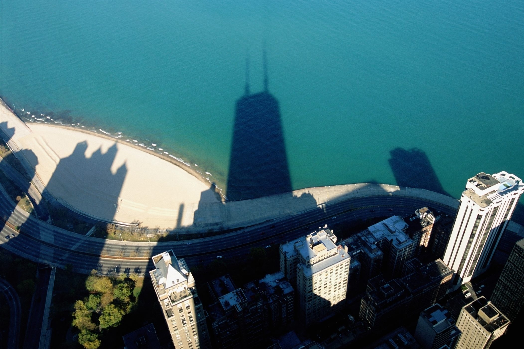 shadows from the city looking down on the water from the John Hancock center