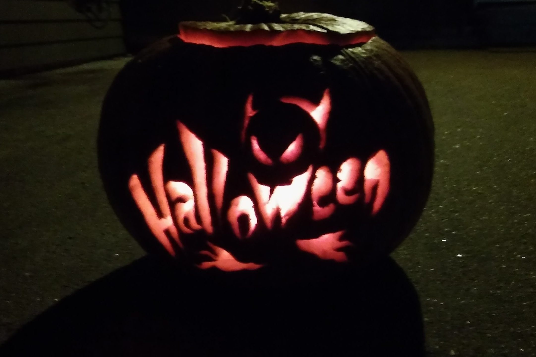 Close-Up Of Illuminated Jack-O-Lantern On Street