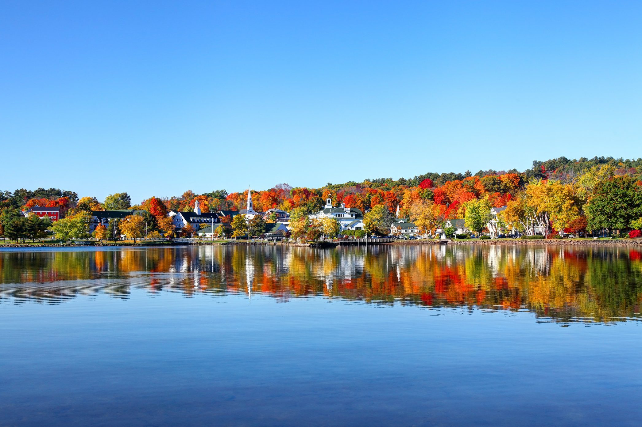 Autumn foliage reflection along the shores of Lake Winnipesaukee