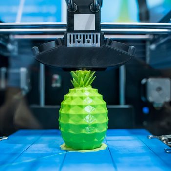 3d Printer printing a green pineapple