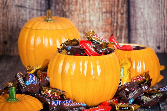 Decorative pumpkins filled with Halloween candy