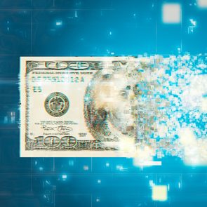 a digital one hundred dollar bill pixelated and disappearing on a blue background