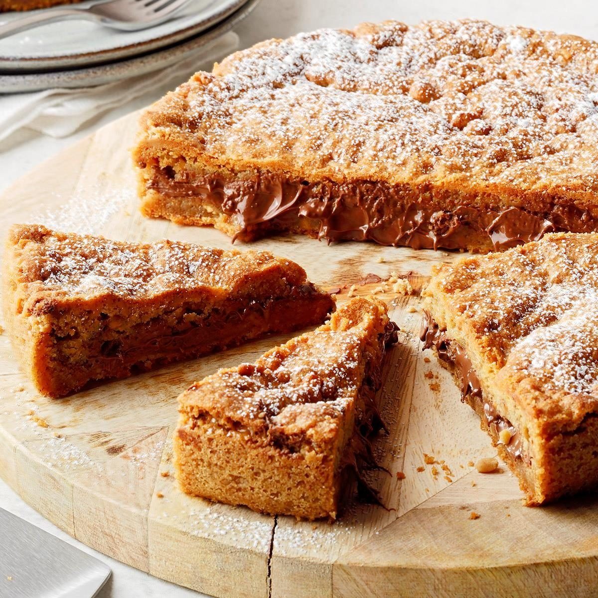 Air Fryer Cookie Pie sliced on a wood board