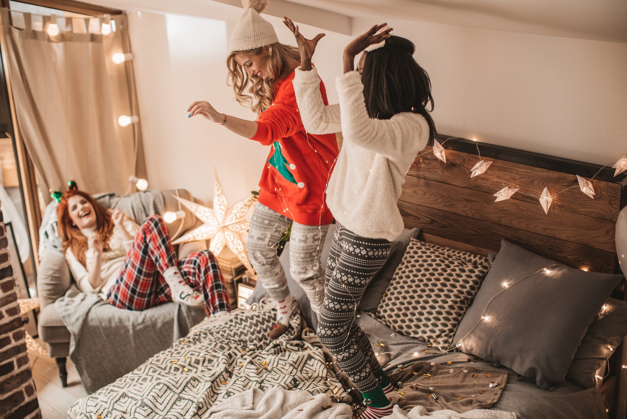 Three young women having a pajama party