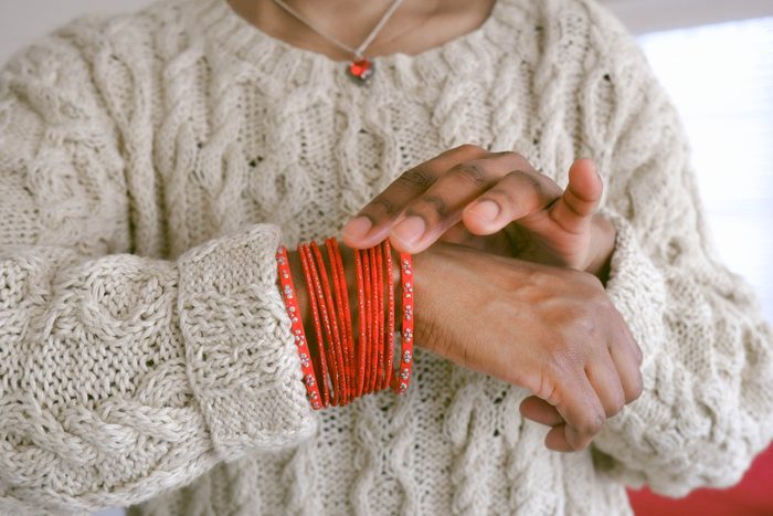 Woman Wears Red Bangles