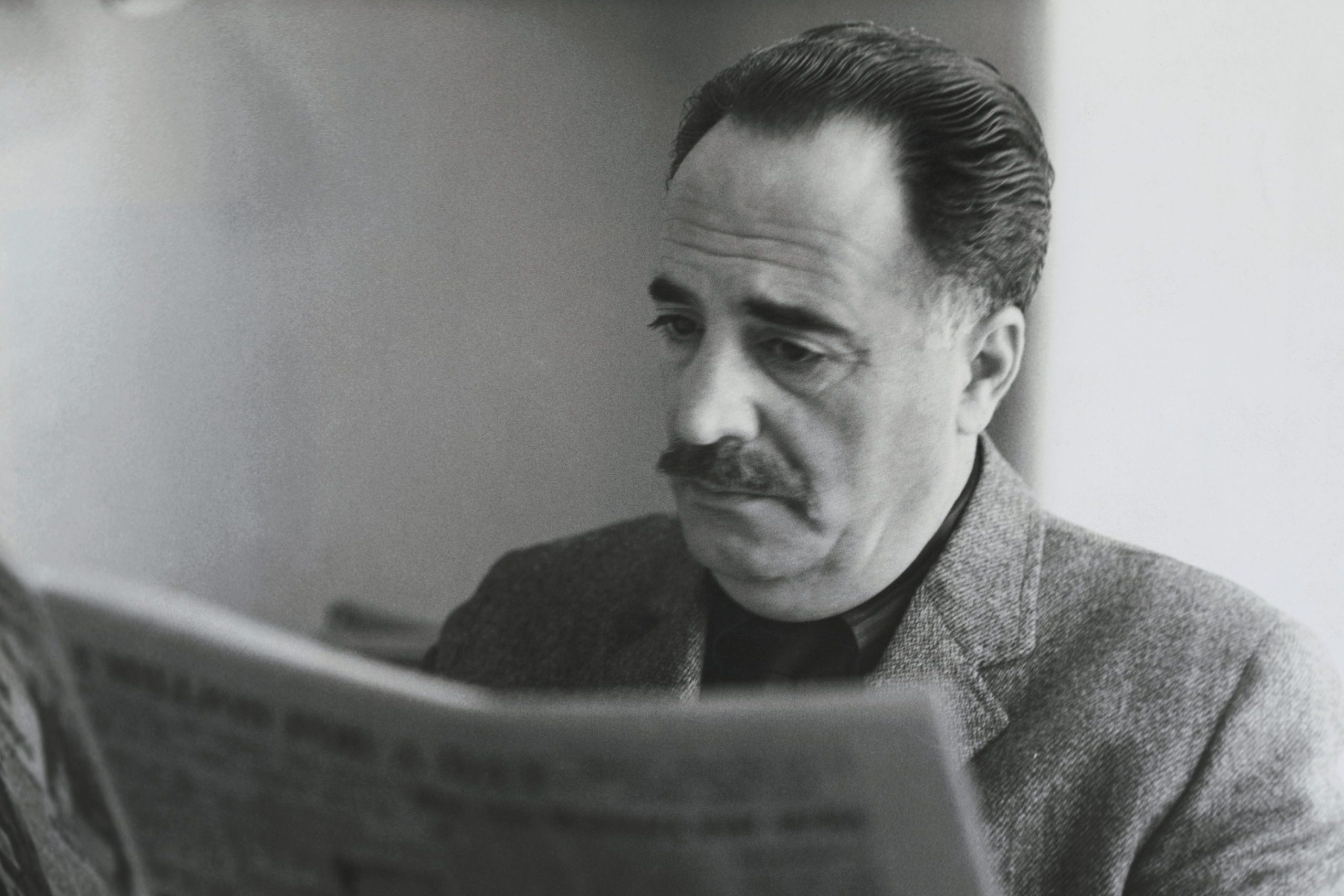 William Saroyan Reading Newspaper