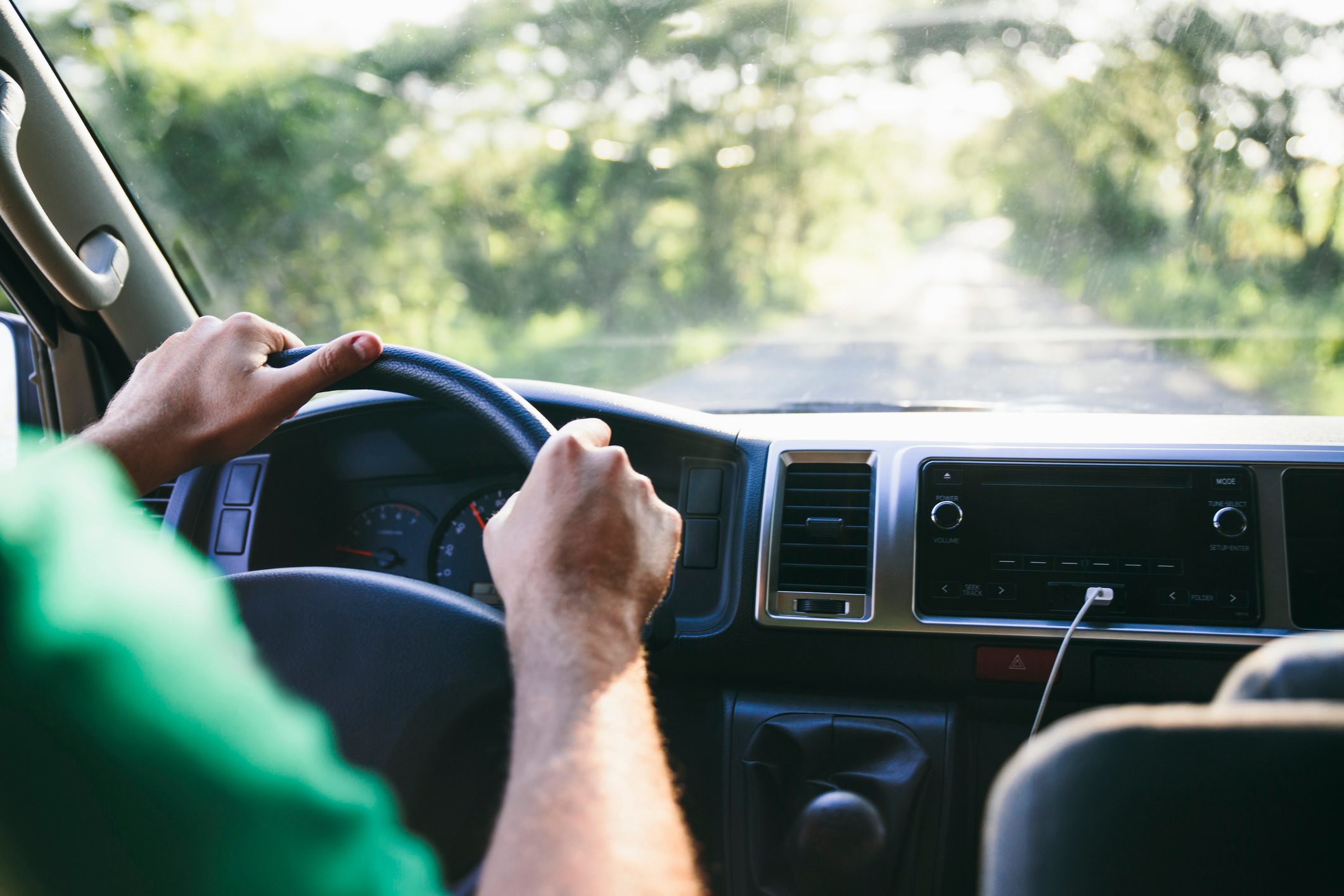 Caucasian man driving car