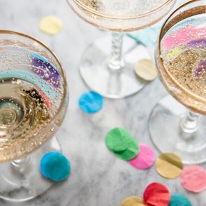 Confetti near glasses of champagne