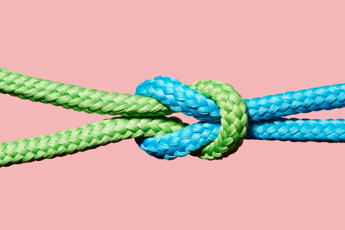 Two coloured ropes knotted together