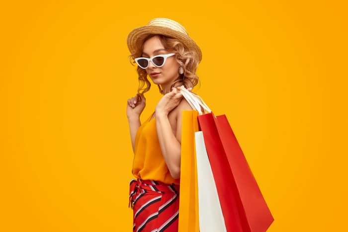 Trendy woman with shopping bags