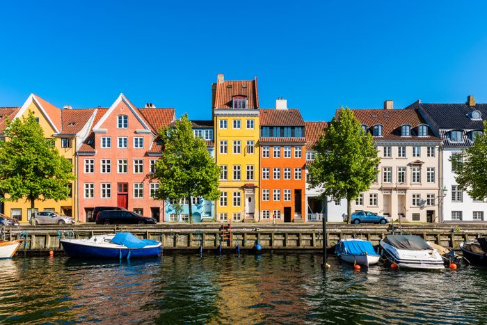 Colourful houses along canal in Copenhagen Denmark