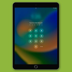 iPad lock screen with X's on a green background