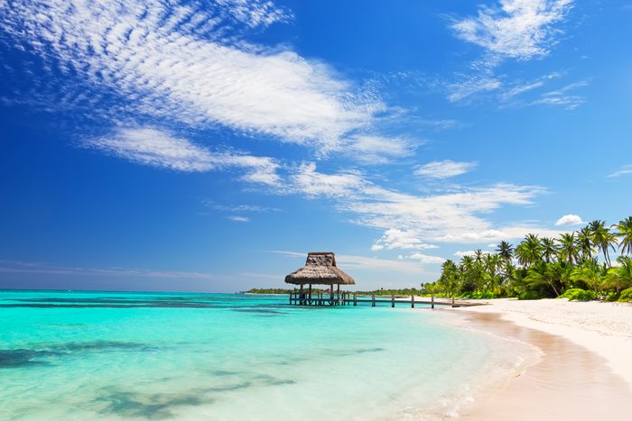 Beautiful gazebo on the tropical white sandy beach