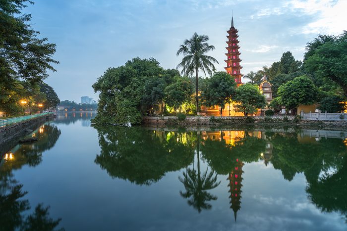 Tran Quoc pagoda during sunset time, the oldest temple in Hanoi, Vietnam. Hanoi cityscape.