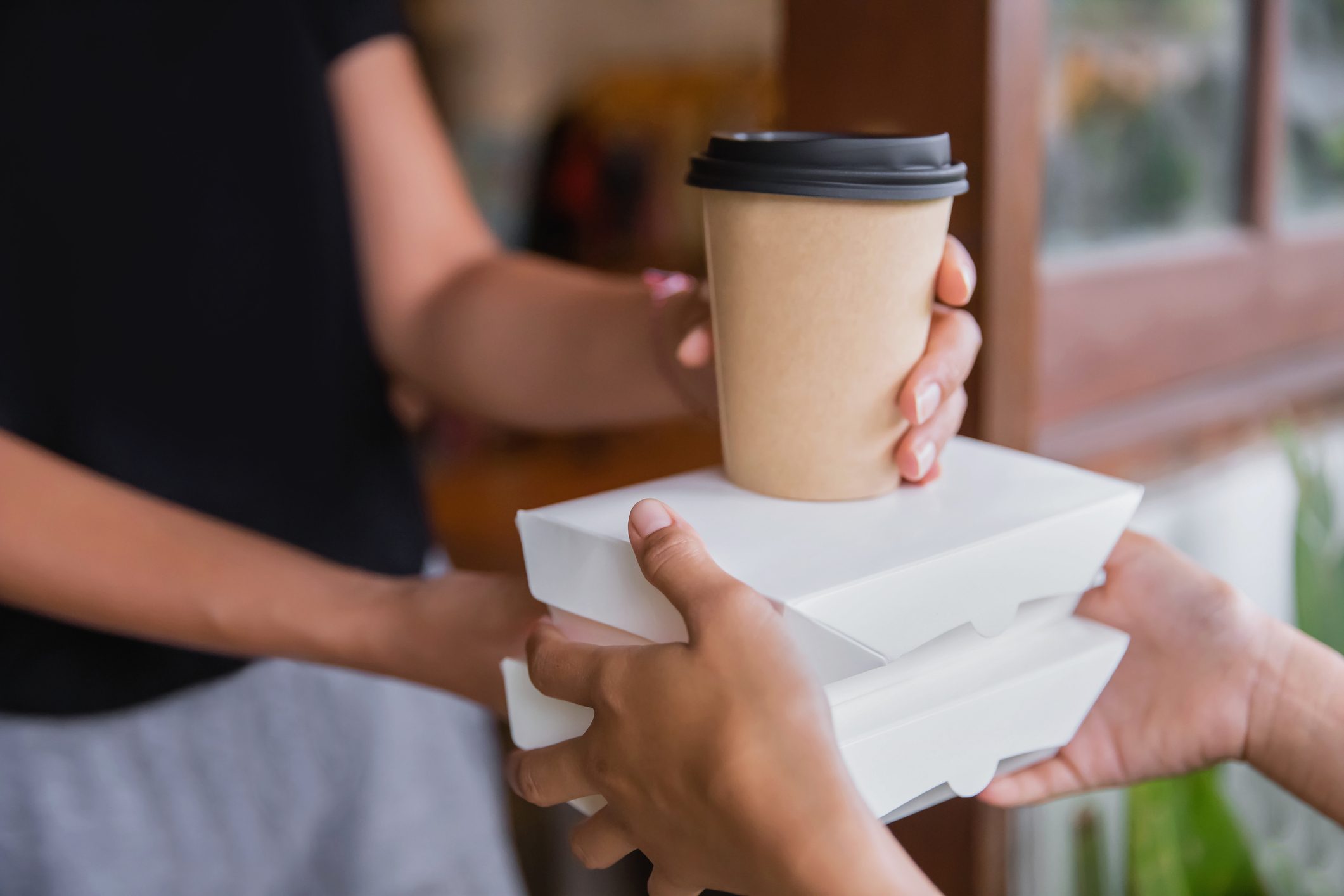 Neighbors sharing food and drinks during Covid 19 pandemic