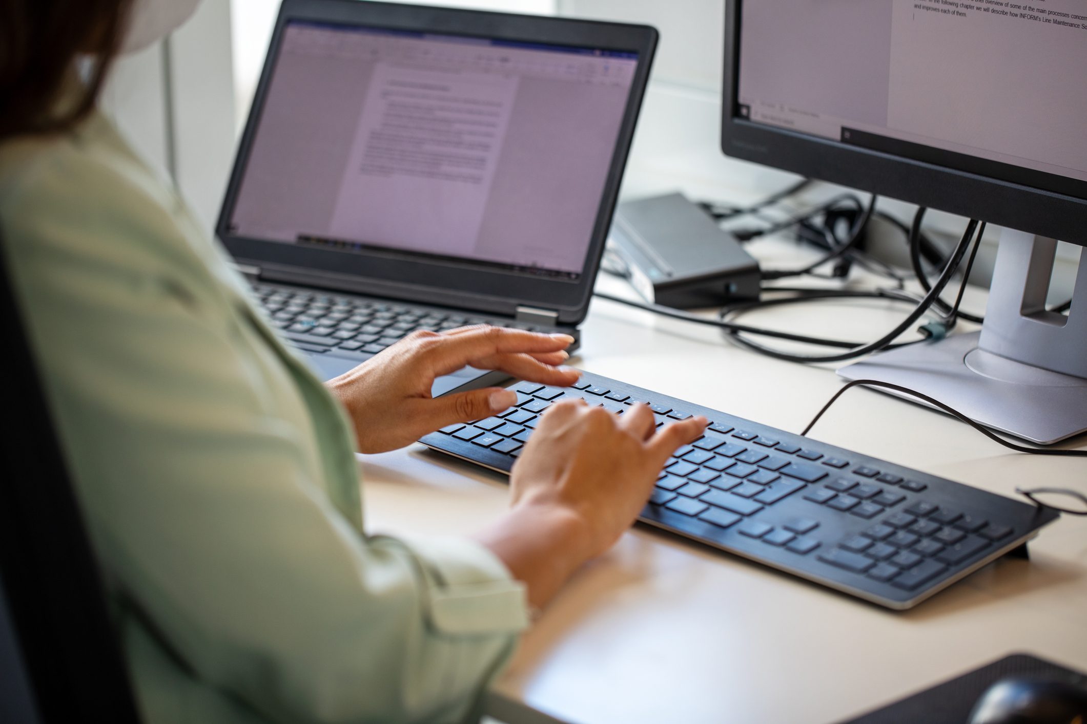 Close-up of a businesswoman using computer