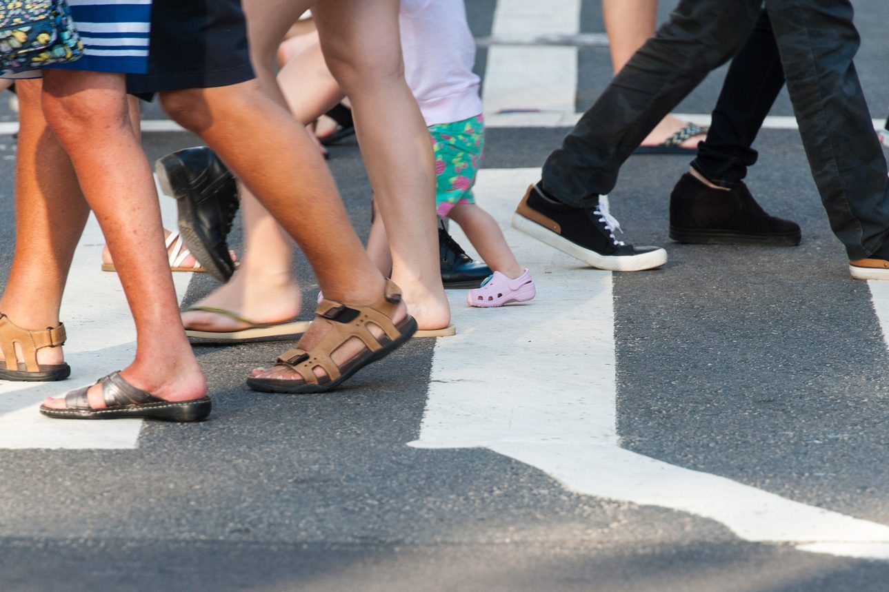 People across the crosswalk