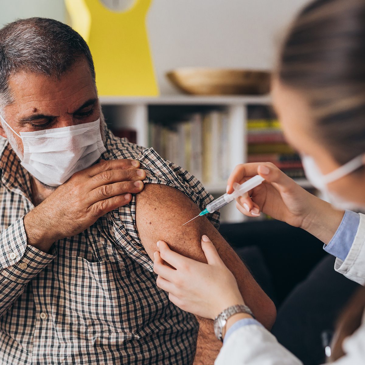 doctor administering a shot