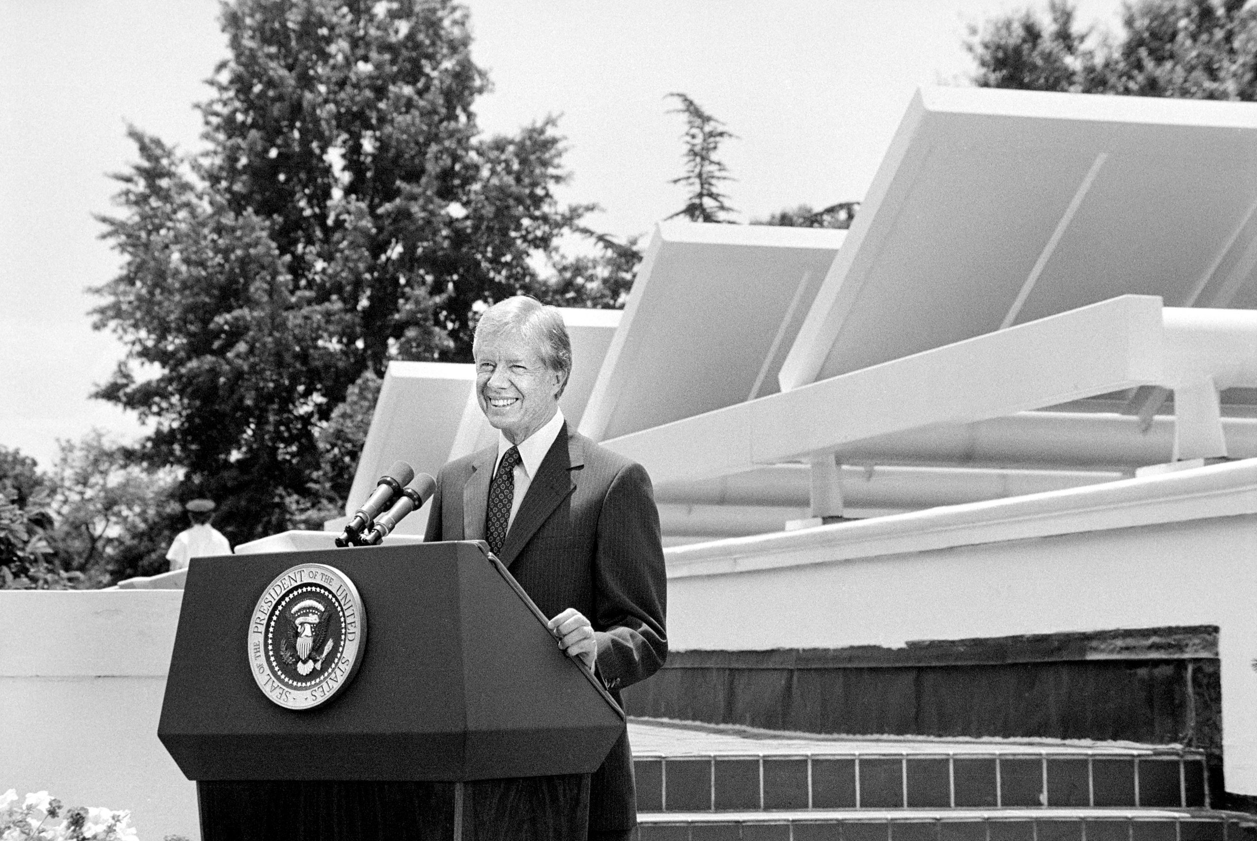 U.S. President Jimmy Carter speaking in front of Solar Panels placed on West Wing Roof of White House, announcing his solar energy policy, Washington, DC, USA, Warren K. Leffler, June 20, 1979