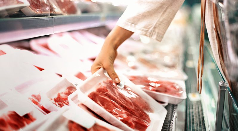 Buying meat at a supermarket