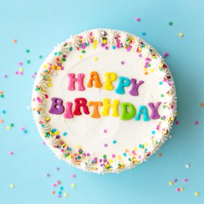 Top view of a Birthday Cake on a blue background