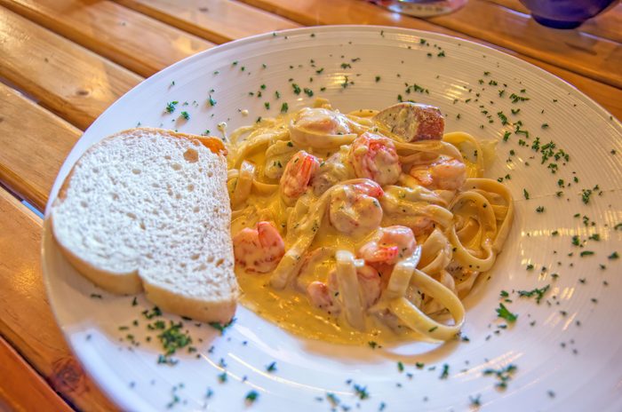 Bowl of creamy shrimp tagliatelle pasta
