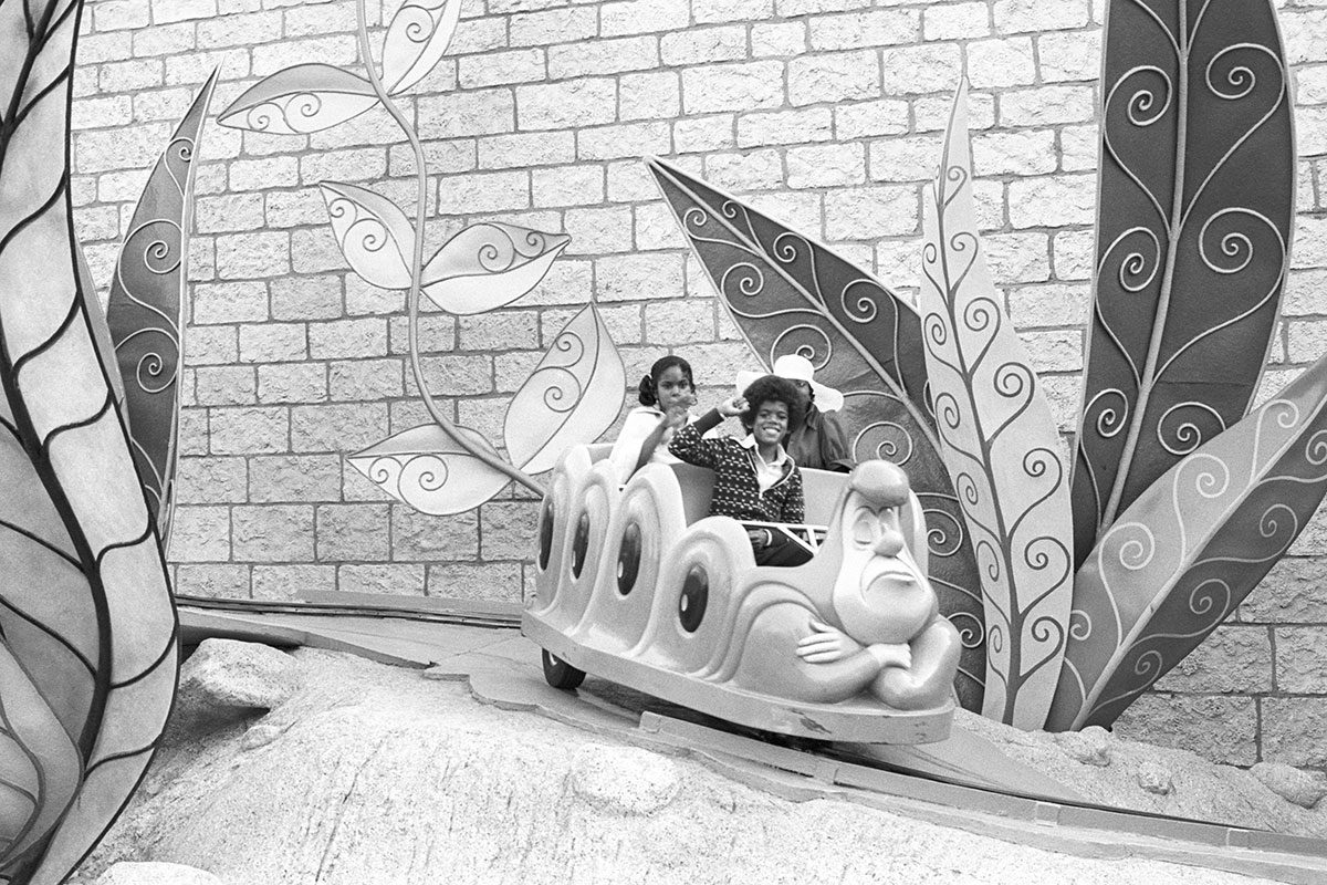 Foster Sylvers and Patricia Lynn Sylvers future members of the R and B group The Sylvers on the Alice In Wonderland ride at Disneyland on September 15, 1973