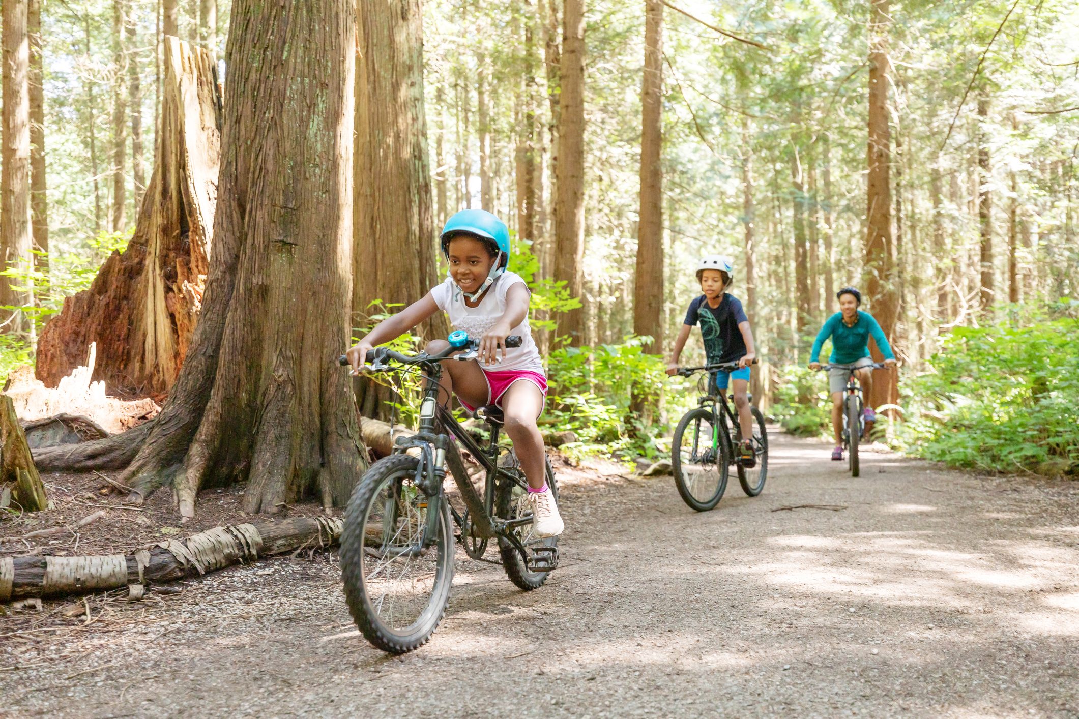 Family biking in the woods