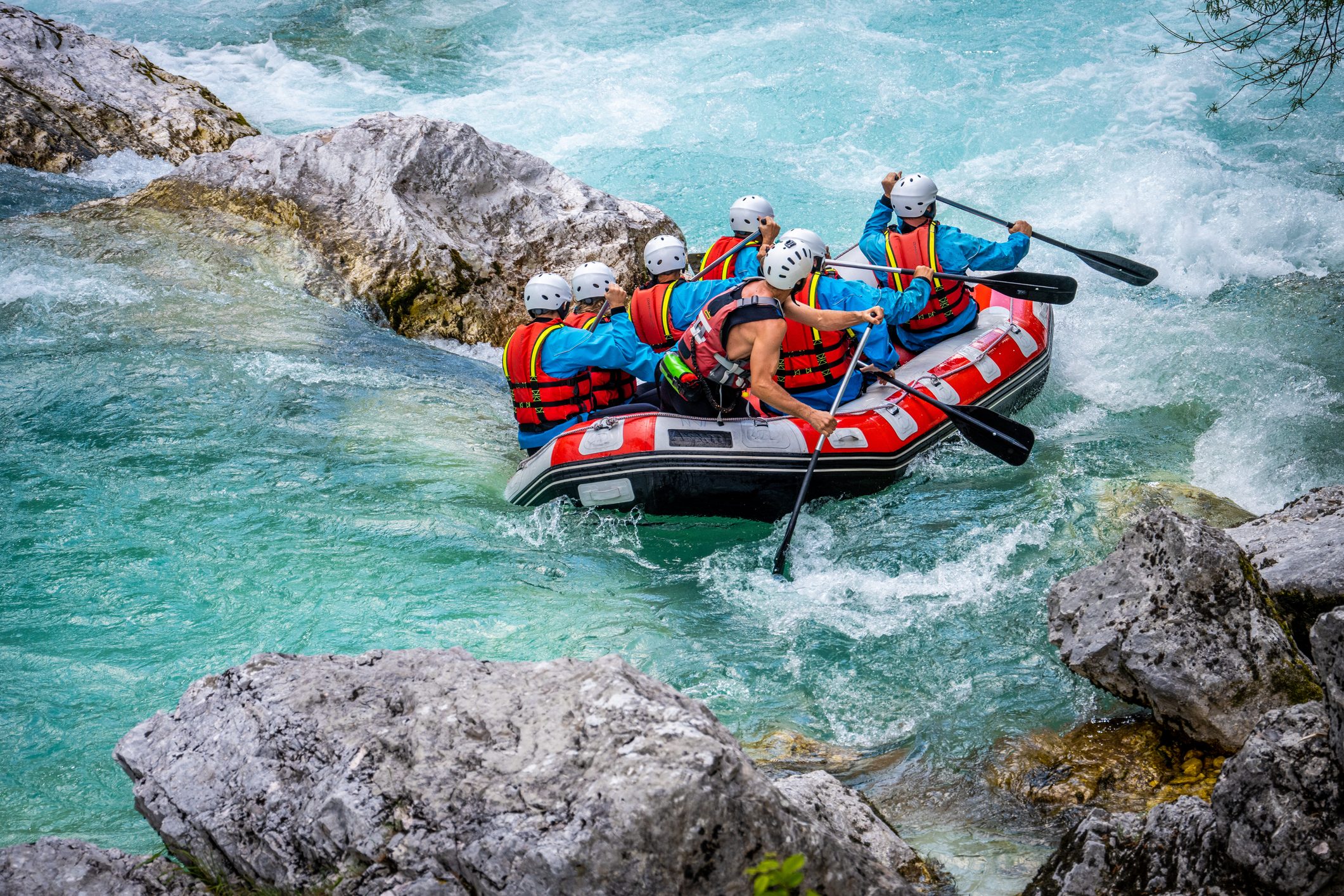Friends rafting in river