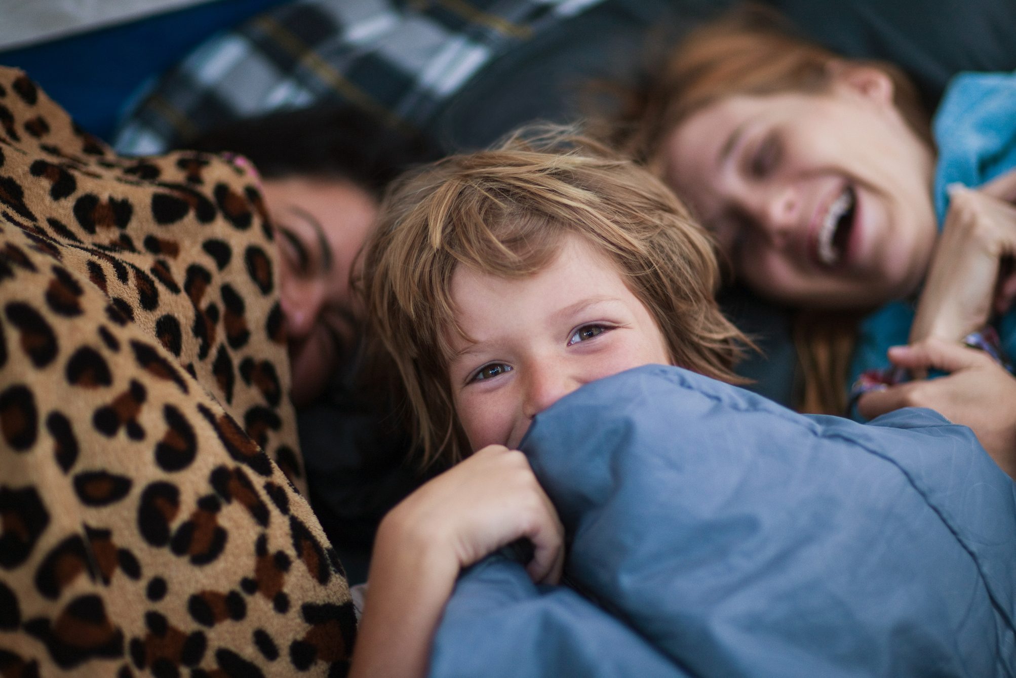 Mother and children in a tent