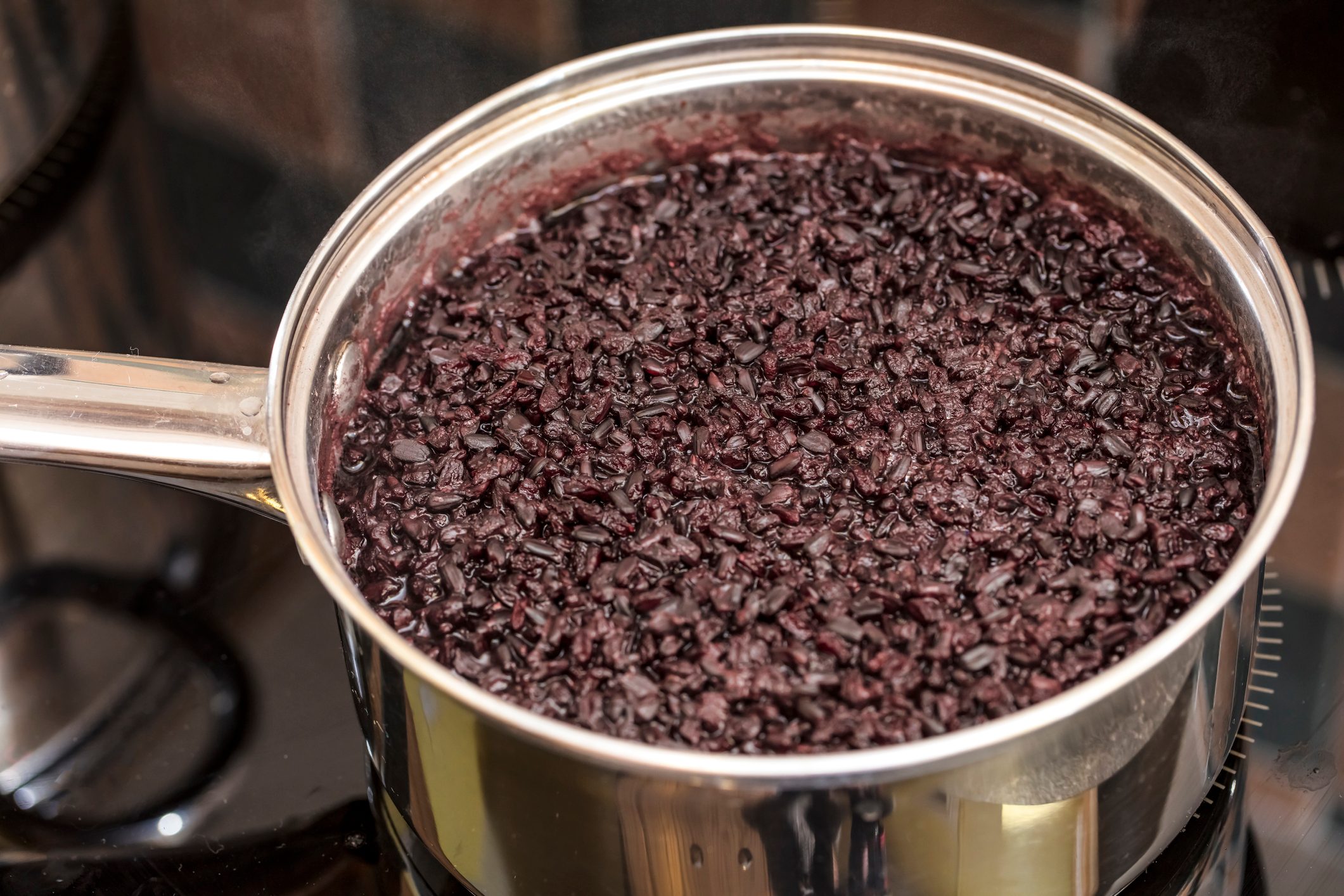 Food Boiling In Utensil At Kitchen, Organic black rice