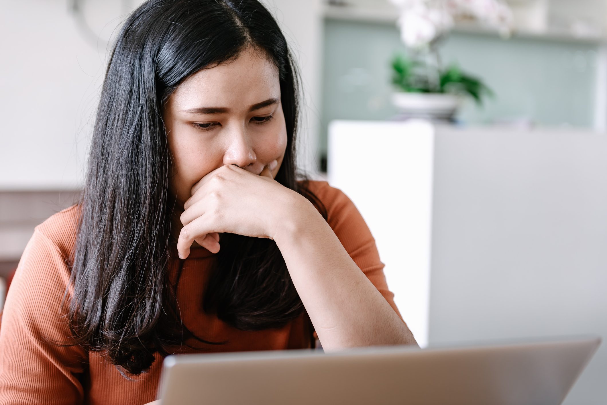 Close-Up Portrait of Businesswoman Working on Laptop While Concentrate Her Job Seriously in Cafe Shop.