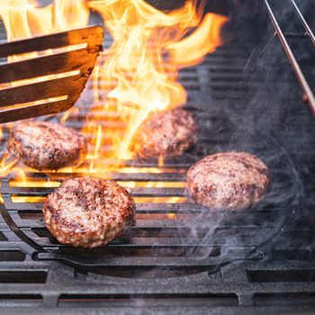Hamburgers cooking on the BBQ