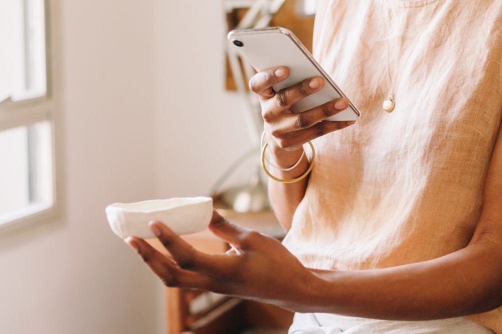 taking photo of a small dish before selling
