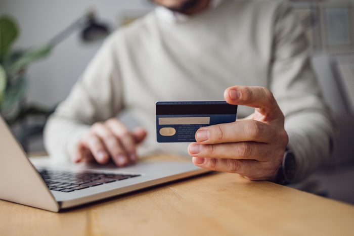 Home Office: Man Doing an Online Purchase