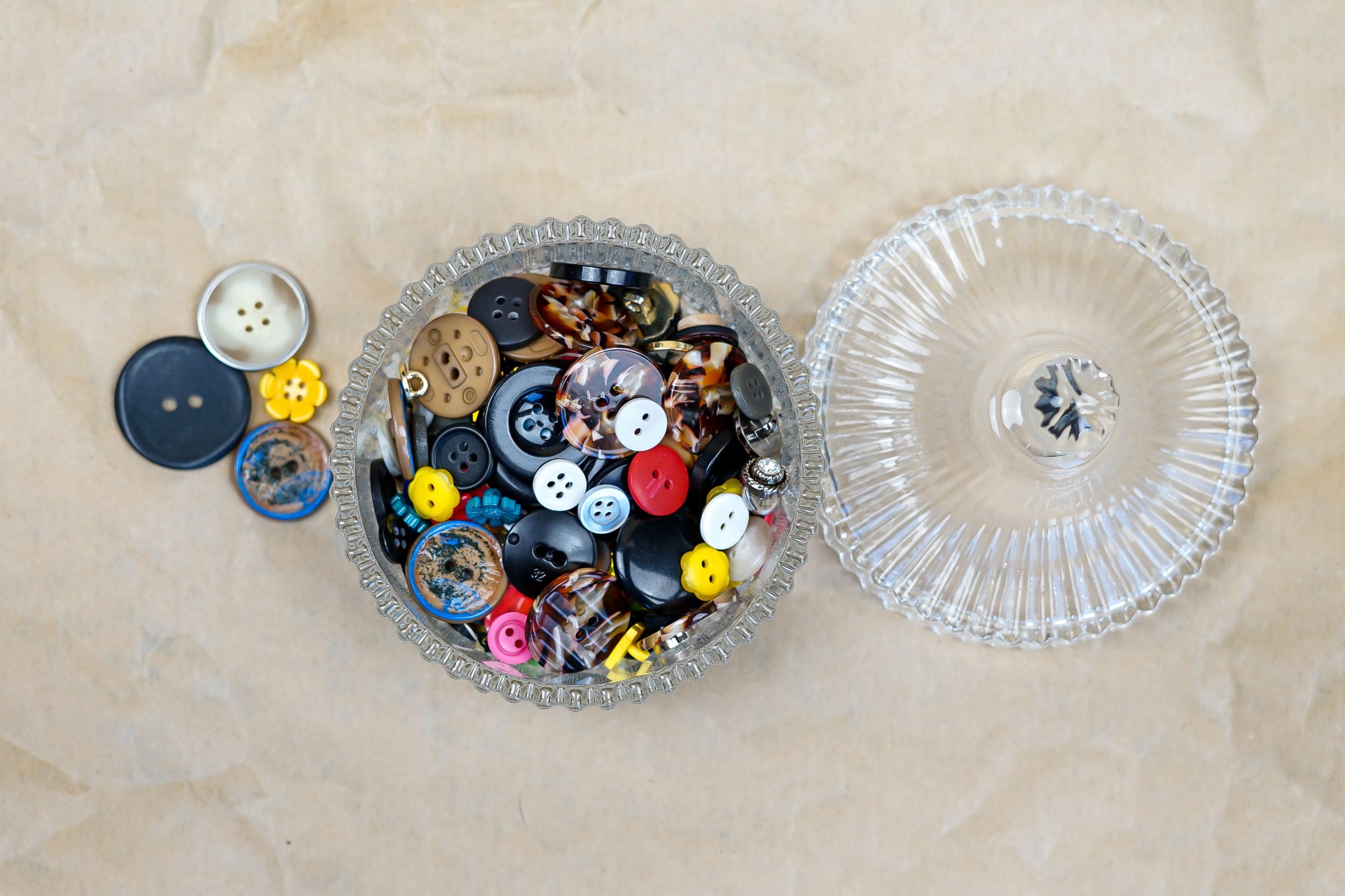 Glass Jar Storing Colourful Buttons