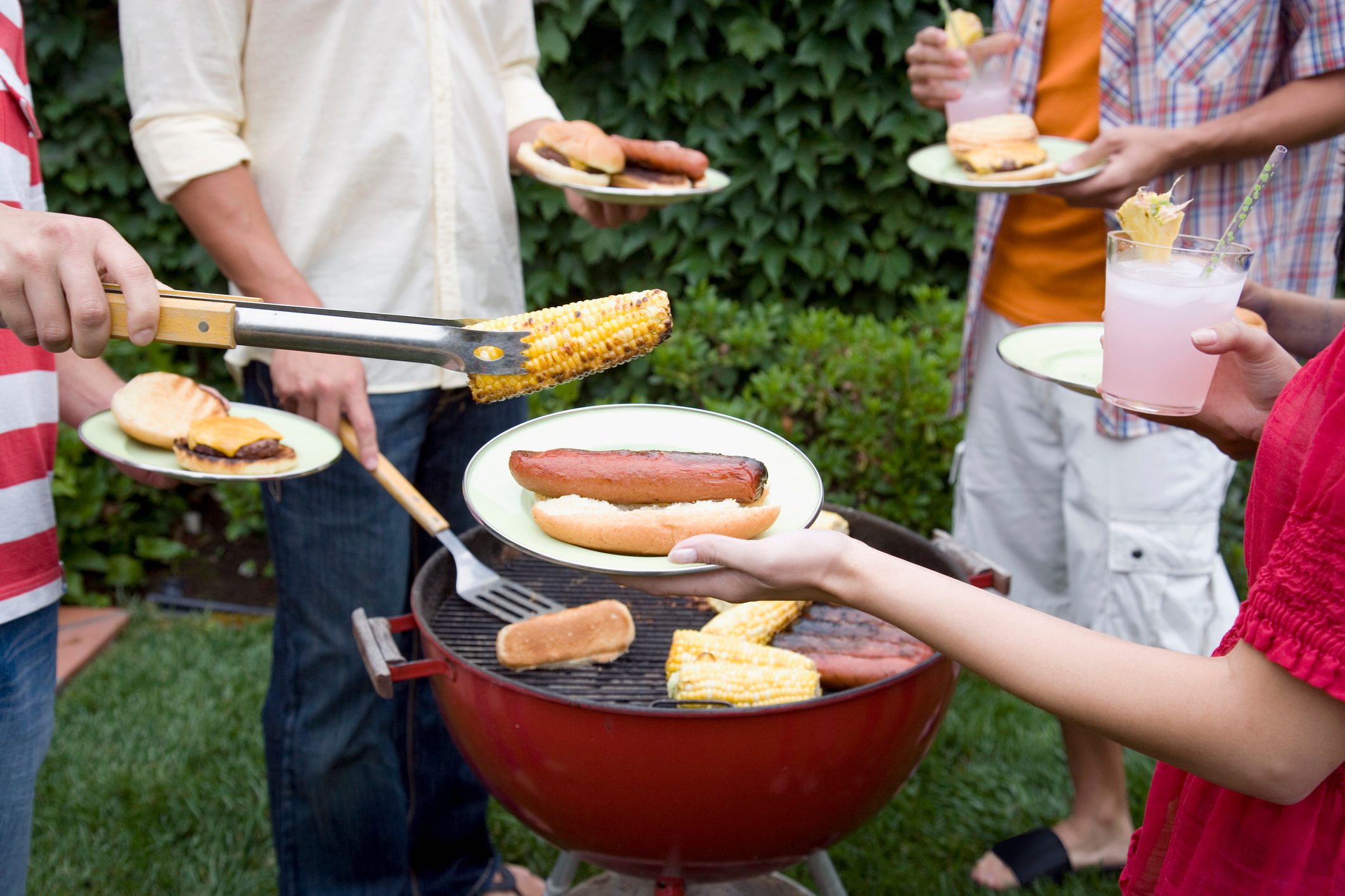 Hispanic friends having barbecue