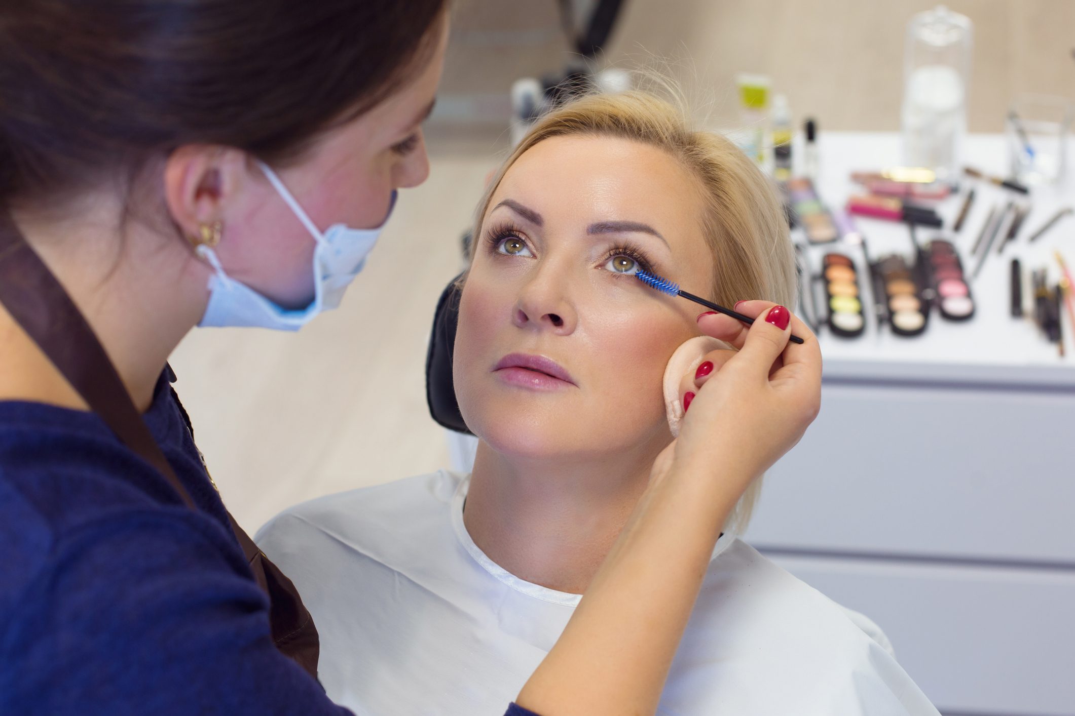 Make-up of mature 49 years old woman, female getting beautiful