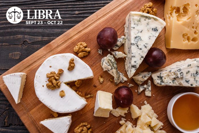 A cheese board with assorted cheeses