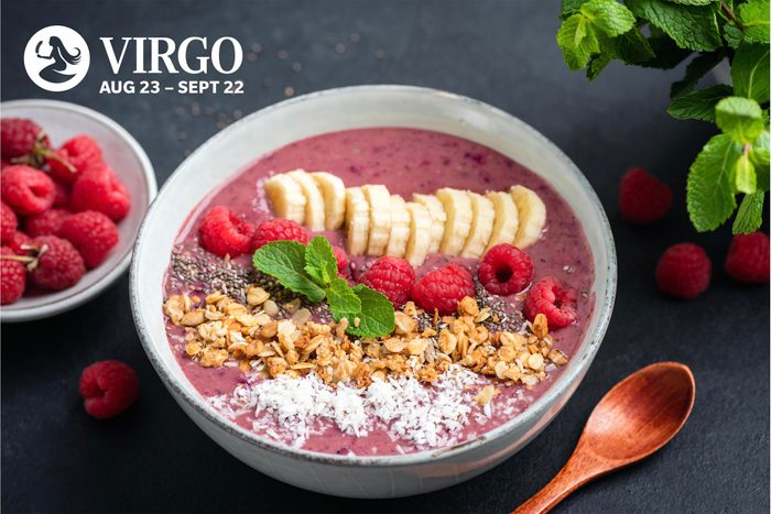 A smoothie bowl with fruit and granola