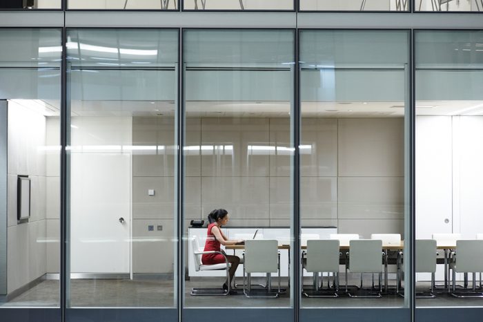 Portrait of business woman working late