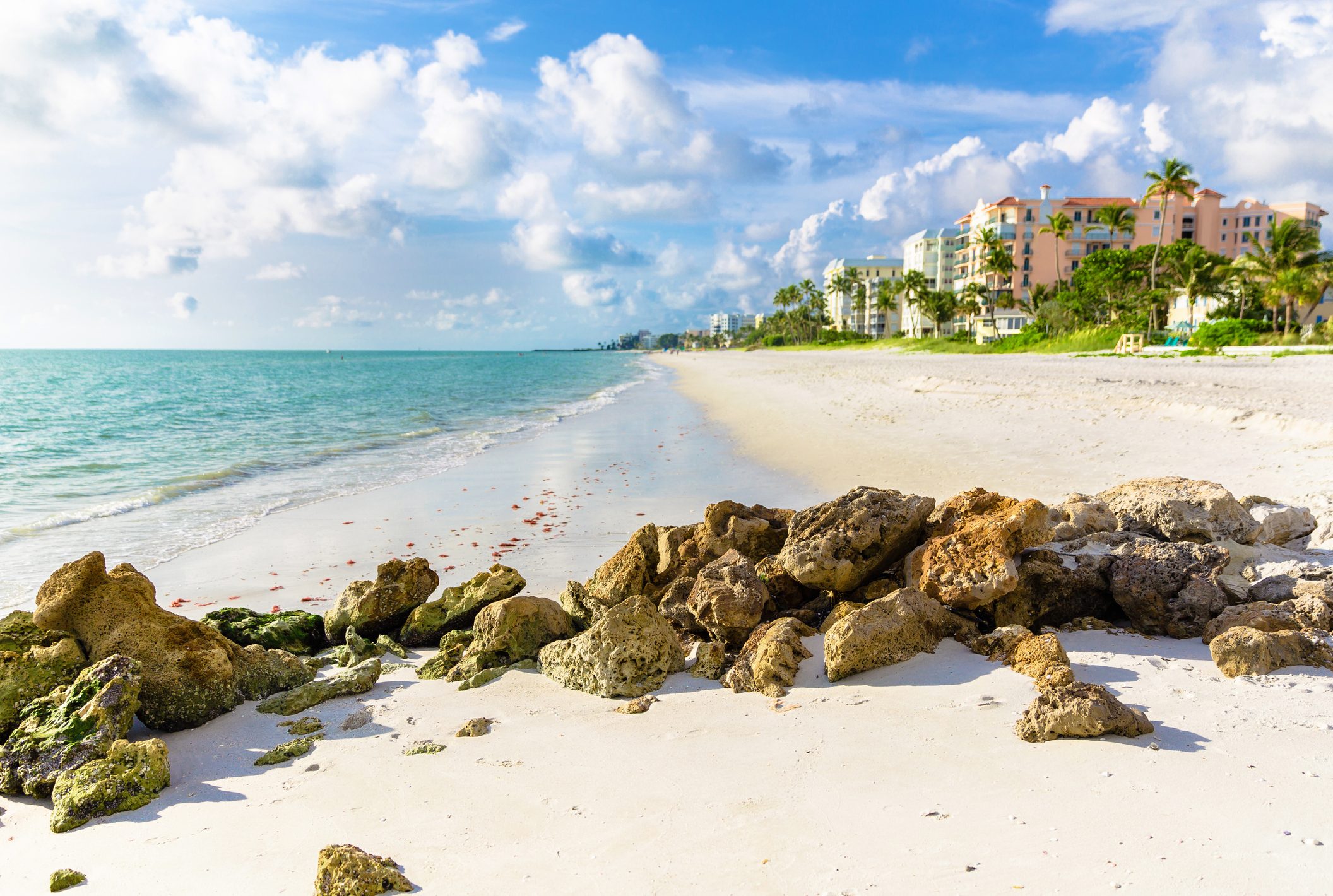 Pristine and idyllic beach at sunset in a bright day, Naples, Florida, USA