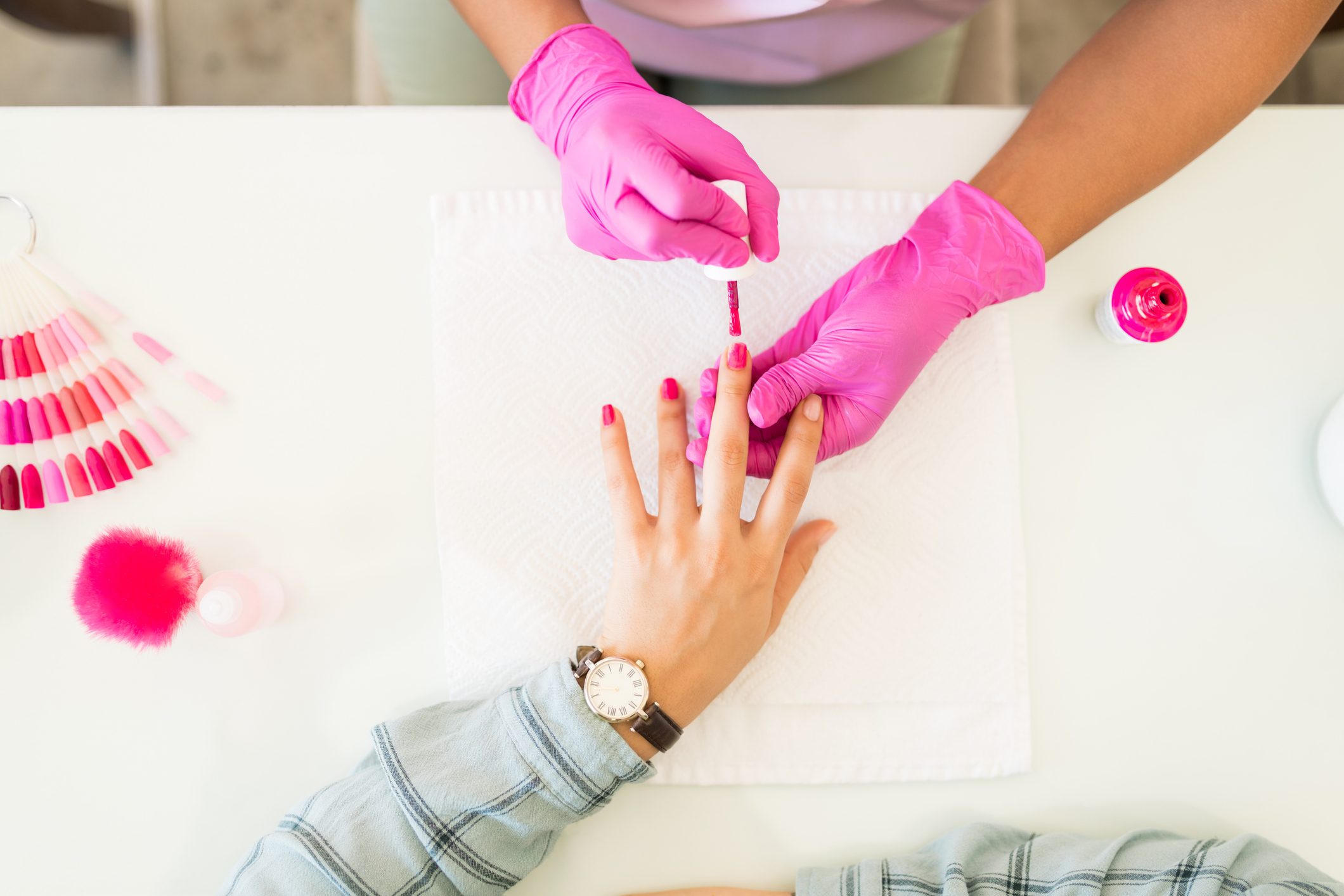 Pink Is Her Choice Of Color At Nail Spa