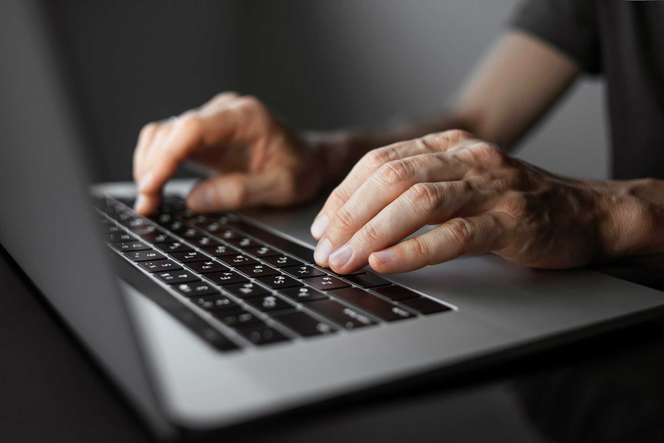 Businessman working on laptop computer at home