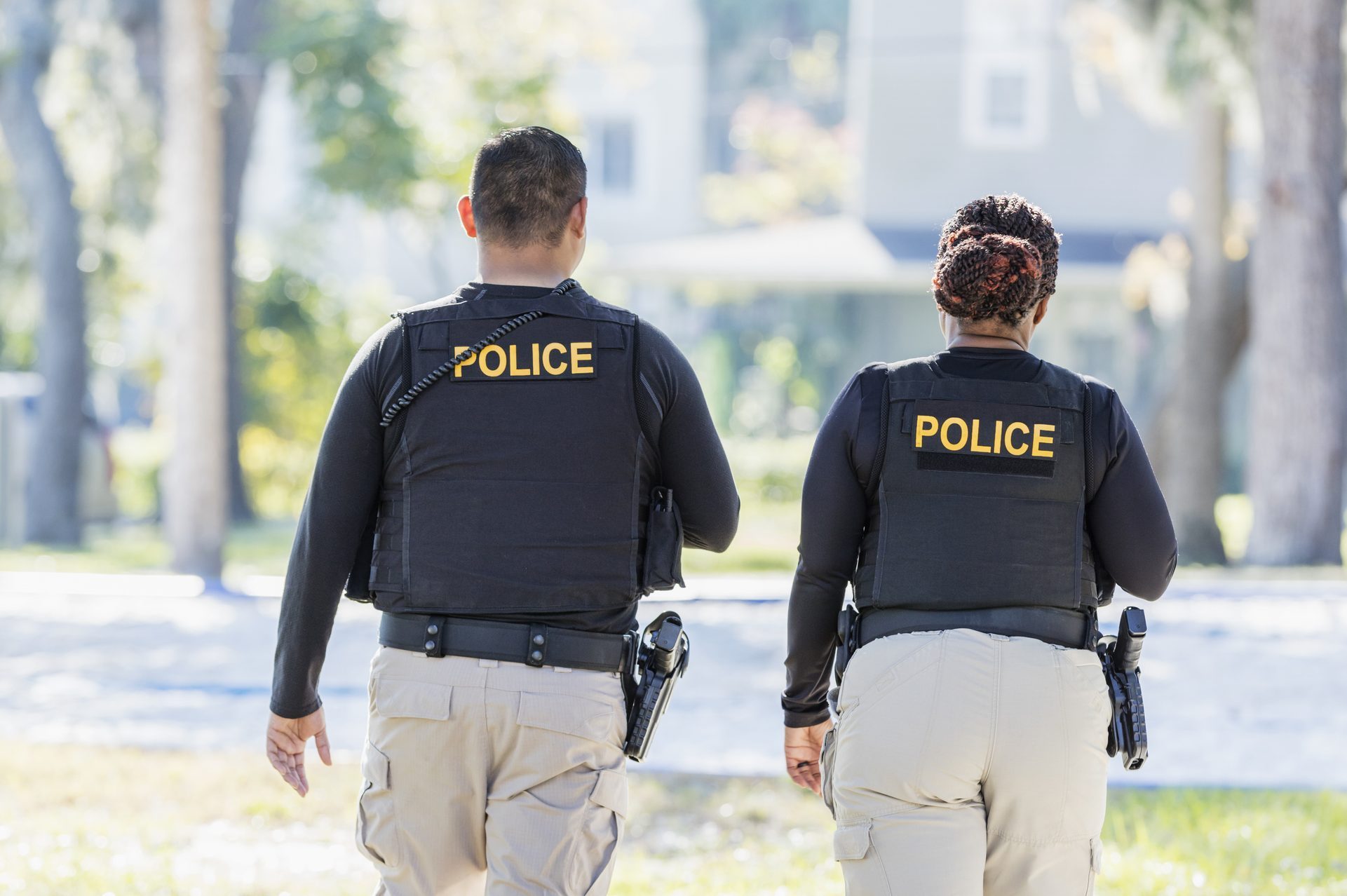 Two police officers walking in community