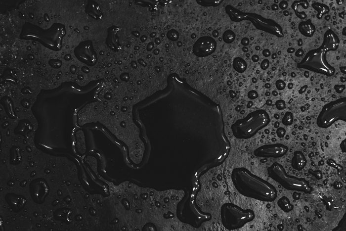 Water puddles on the bathroom floor