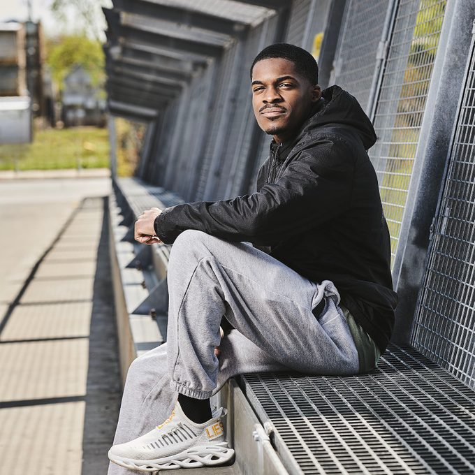 Anthony Perry sitting on a bench