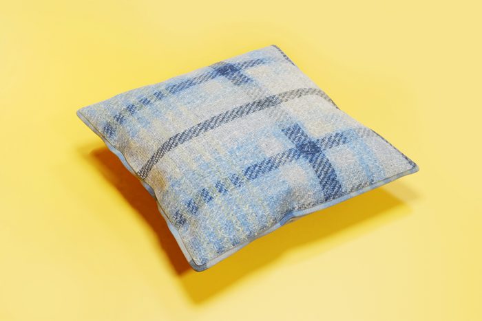 Pillow on yellow background
