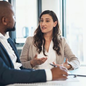 woman asking her boss for a raise